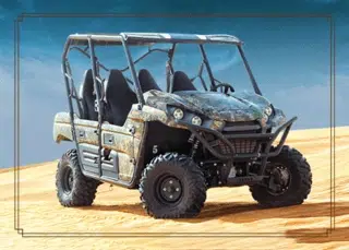 800cc dune buggy racing through desert dunes