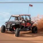 Dune buggy riding through the desert terrain