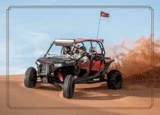 Dune buggy riding through the desert terrain